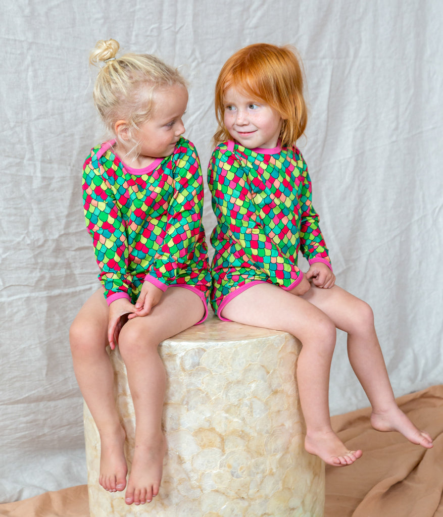 pink and green fish dragon scales baby clothes